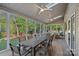 Bright sunroom with lots of windows, skylights, ceiling fans, and an outdoor view at 300 Yacht Rd, Mooresville, NC 28117