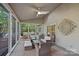 Bright sunroom with lots of windows, a ceiling fan, and an outdoor view at 300 Yacht Rd, Mooresville, NC 28117