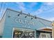 Attractive blue building with a prominent sign, stylish lighting fixtures and a modern design at 3108 Anne St, Charlotte, NC 28205