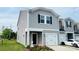 Charming new construction home featuring a one-car garage and craftsman details at 3790 Backwater St, Concord, NC 28027