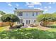 Backyard with patio, grill, outdoor dining set, and lush landscaping at 3831 Robeson Creek Dr, Charlotte, NC 28270