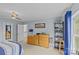 Comfortable bedroom boasts a ceiling fan, neutral paint, and natural light coming through the windows at 3831 Robeson Creek Dr, Charlotte, NC 28270