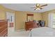 Spacious bedroom featuring a dresser, a desk, and an ensuite bathroom at 3831 Robeson Creek Dr, Charlotte, NC 28270