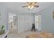 Comfortable bedroom with a large closet, neutral paint, and natural light coming through the window at 3831 Robeson Creek Dr, Charlotte, NC 28270