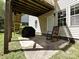 Backyard patio with seating and a grill, perfect for outdoor entertaining at 3914 Cassidy Dr, Waxhaw, NC 28173
