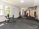 Finished basement featuring home gym equipment and ample space for workouts at 3914 Cassidy Dr, Waxhaw, NC 28173
