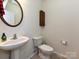 Half bathroom featuring a pedestal sink and toilet at 3914 Cassidy Dr, Waxhaw, NC 28173