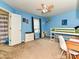 Bright, blue bedroom with a bunk bed, ceiling fan, and natural light at 3914 Cassidy Dr, Waxhaw, NC 28173