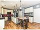 Well-lit kitchen with an island, stainless steel appliances, and access to dining space at 3914 Cassidy Dr, Waxhaw, NC 28173