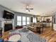 Spacious living room with fireplace, ceiling fan, and seamless flow into the open kitchen at 3914 Cassidy Dr, Waxhaw, NC 28173