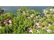 A high-angle view of the houses with docks and lush green trees on a lake at 4036 Windward Dr, Tega Cay, SC 29708