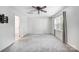 Spacious bedroom offering neutral walls, a ceiling fan, carpet flooring, and bright window at 4036 Windward Dr, Tega Cay, SC 29708