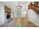 The living room features wood floors and a fireplace with stone surround at 4036 Windward Dr, Tega Cay, SC 29708