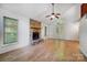 Living room with wood floors, a stone fireplace, and natural light at 4036 Windward Dr, Tega Cay, SC 29708