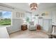 Serene Bedroom with a cozy chair, natural light, and decor, creating a comforting and inviting space at 4040 Lauren Elizabeth Dr, Rock Hill, SC 29732