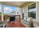 Outdoor deck featuring a grill, comfortable seating, and a view of the neighborhood, perfect for relaxation at 4040 Lauren Elizabeth Dr, Rock Hill, SC 29732