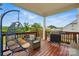 Relaxing deck with a hanging chair, comfortable seating, and a grill, perfect for outdoor entertaining at 4040 Lauren Elizabeth Dr, Rock Hill, SC 29732
