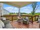 Inviting deck featuring comfortable seating, a hanging chair, and a view of the backyard at 4040 Lauren Elizabeth Dr, Rock Hill, SC 29732