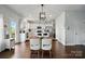 Dining area with modern chandelier adjacent to the kitchen and featuring stainless steel appliances at 4040 Lauren Elizabeth Dr, Rock Hill, SC 29732