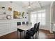 Elegant dining room with a marble table, stylish black chairs, and decorative shelving at 4040 Lauren Elizabeth Dr, Rock Hill, SC 29732