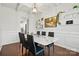 Elegant dining room with a marble table, stylish black chairs, and decorative shelving at 4040 Lauren Elizabeth Dr, Rock Hill, SC 29732