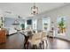 Spacious living room features a large dining area, sleek hardwood floors, and abundant natural light at 4040 Lauren Elizabeth Dr, Rock Hill, SC 29732