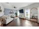 Bright living room with hardwood floors, large windows, stylish decor, and modern furnishings at 4040 Lauren Elizabeth Dr, Rock Hill, SC 29732