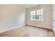 Comfortable bedroom with wood floors and a window offering plenty of natural light at 4110 Camden Glen Rd, Lancaster, SC 29720