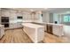 Spacious kitchen with gray cabinets, stainless steel appliances, white countertops, and an island at 4110 Camden Glen Rd, Lancaster, SC 29720