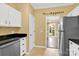 Modern kitchen with stainless steel appliances and eat-in breakfast bar at 4155 Guilford Nw Ct, Concord, NC 28027
