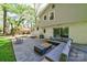 Home's expansive backyard featuring an outdoor patio, lush landscaping at 4313 Sudbury Rd, Charlotte, NC 28205