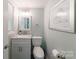 Bathroom featuring a marble countertop, modern vanity, and sleek fixtures at 4313 Sudbury Rd, Charlotte, NC 28205