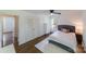 Bedroom featuring hardwood floors and a grey upholstered bed frame at 4313 Sudbury Rd, Charlotte, NC 28205