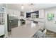 Modern kitchen featuring white cabinetry, stainless appliances, and lots of counter space at 4313 Sudbury Rd, Charlotte, NC 28205