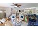 Open living space with a view into the kitchen; hardwood floors; modern furniture at 4313 Sudbury Rd, Charlotte, NC 28205