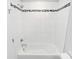 Clean white tiled shower and tub combination with black accent tiles and updated shower head at 510 Music Hall Way, Charlotte, NC 28203