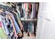 Walk-in closet is equipped with closet system and plentiful hanging space for clothes, shoes, and accessories at 510 Music Hall Way, Charlotte, NC 28203