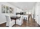 Open-concept design showcasing a dining area flowing seamlessly into a modern kitchen and comfortable living space at 510 Music Hall Way, Charlotte, NC 28203