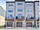 Modern townhome complex with private garage spaces and balconies at 510 Music Hall Way, Charlotte, NC 28203