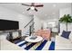 Bright open-concept layout with staircase, kitchen, and living area seamlessly connected, perfect for modern living at 510 Music Hall Way, Charlotte, NC 28203