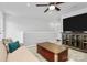 Spacious living room featuring a TV, sofa, unique coffee table, and a ceiling fan at 510 Music Hall Way, Charlotte, NC 28203
