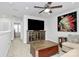 Comfortable living room featuring a TV, entertainment center, sofa, and a ceiling fan at 510 Music Hall Way, Charlotte, NC 28203