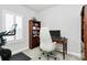 Bright office features modern lighting, shutters, and a built-in bookshelf at 510 Music Hall Way, Charlotte, NC 28203