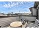 Outdoor patio featuring comfortable seating and stunning views of the cityscape in the background at 510 Music Hall Way, Charlotte, NC 28203