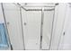 Bright tiled shower features a glass door, bench, and shower head at 510 Music Hall Way, Charlotte, NC 28203