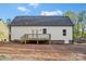Exterior view of the backyard featuring a deck and level ground, offering outdoor living and recreational opportunities at 522 Waco Rd, Kings Mountain, NC 28086