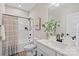 Well-lit bathroom with a modern vanity, stylish fixtures, and a shower-tub combo, offering a clean and functional space at 522 Waco Rd, Kings Mountain, NC 28086