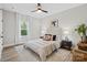 Bright bedroom with plush carpet, a ceiling fan, and a window with natural light at 522 Waco Rd, Kings Mountain, NC 28086