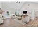 Bright living room with vaulted ceiling, modern furnishings, and plenty of natural light at 522 Waco Rd, Kings Mountain, NC 28086