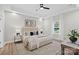 Inviting main bedroom featuring a tray ceiling, neutral decor, and large windows with natural light at 522 Waco Rd, Kings Mountain, NC 28086